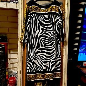 Exclusively by Joseph Ribkoff a Zebra and Leopard dress size 14 only worn once.